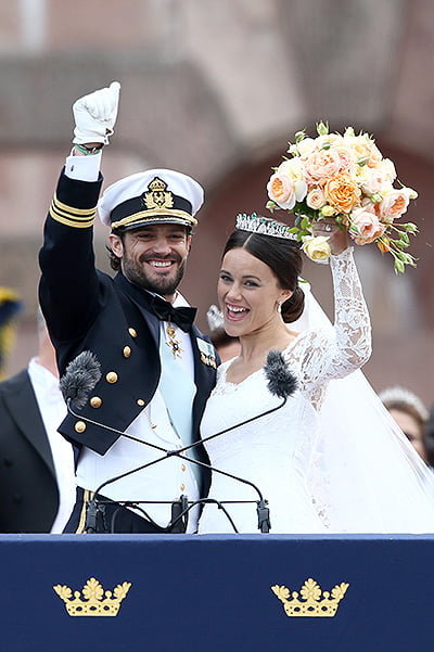 STOCKHOLM, SWEDEN - JUNE 13: Prince Carl Philip of Sweden and his wife Princess Sofia of Sweden salute the crowd after their marriage ceremony on June 13, 2015 in Stockholm, Sweden. (Photo by Andreas Rentz/Getty Images)